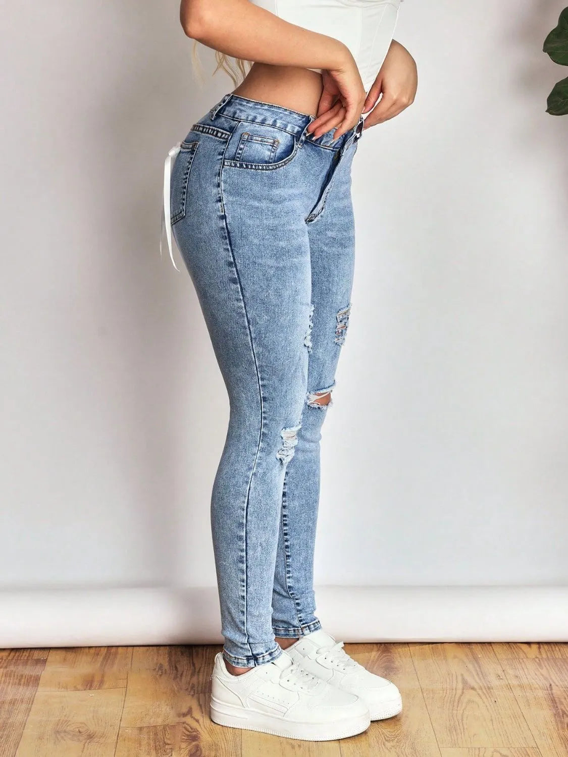 Distressed Skinny Jeans with Bow Back Berry Charmz