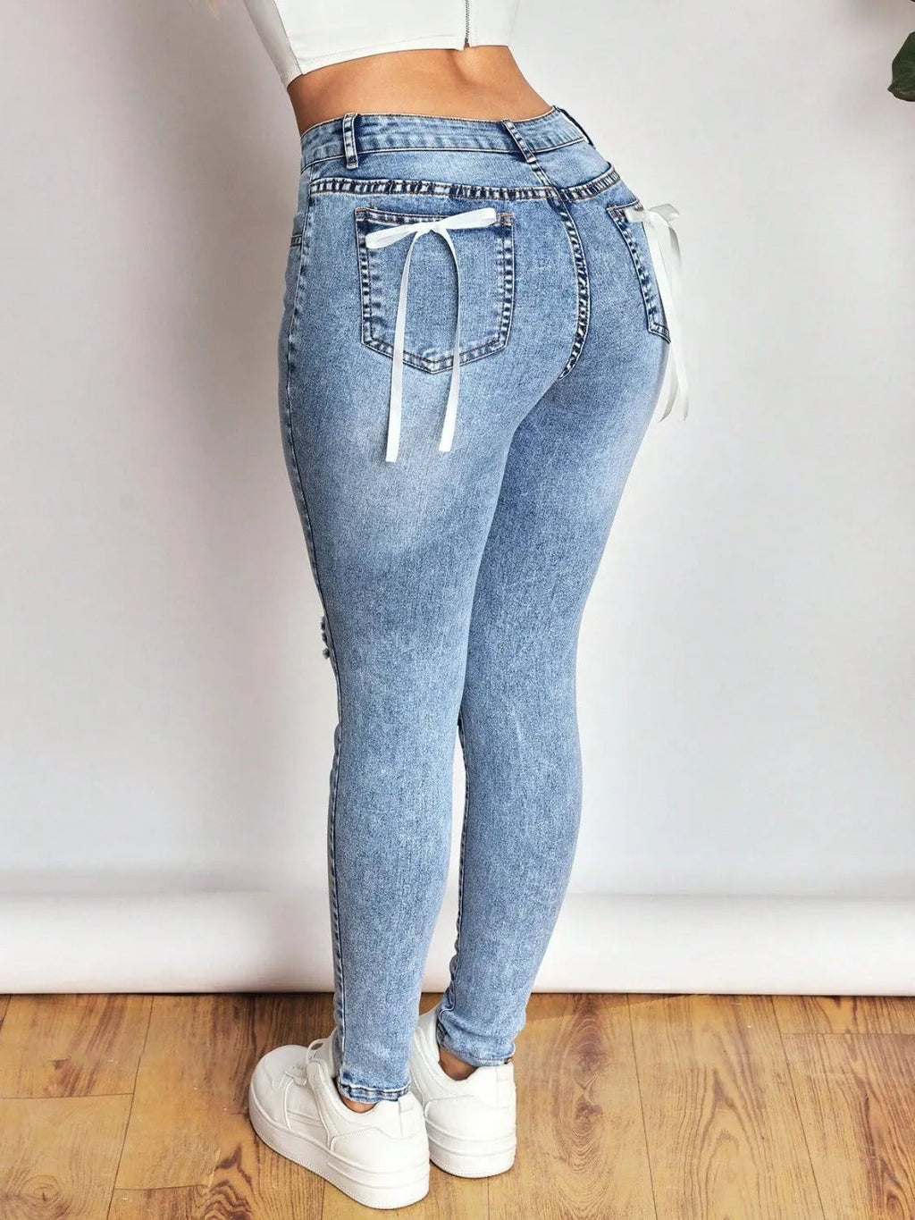 Distressed Skinny Jeans with Bow Back Berry Charmz